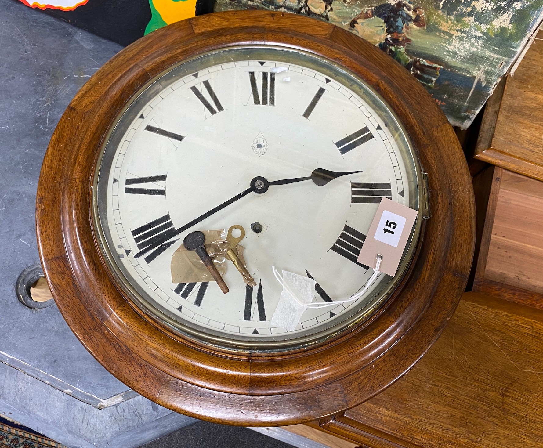 An early 20th century circular mahogany wall dial, diameter 43cm